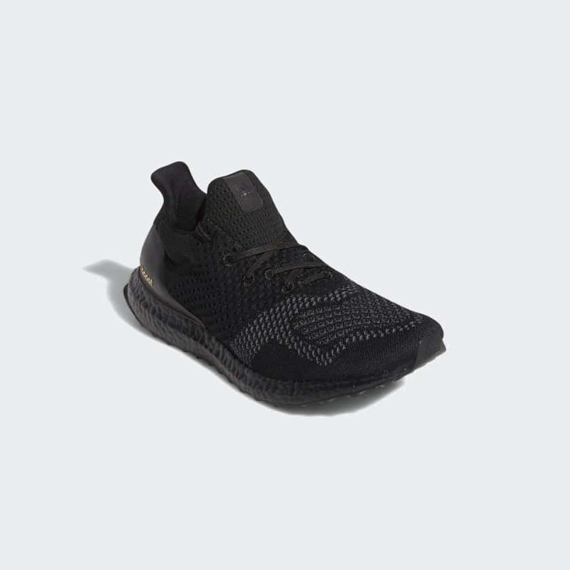 Ultra boost uncaged triple on sale black